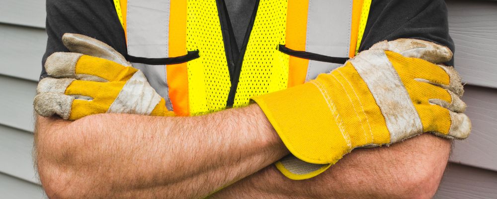 man working with mechanical work gloves