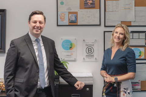 picture of Ben Houchen with Jessica Williams in front of a B Corp wall plaque