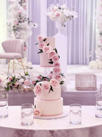 3 tier wedding cake with pink roses