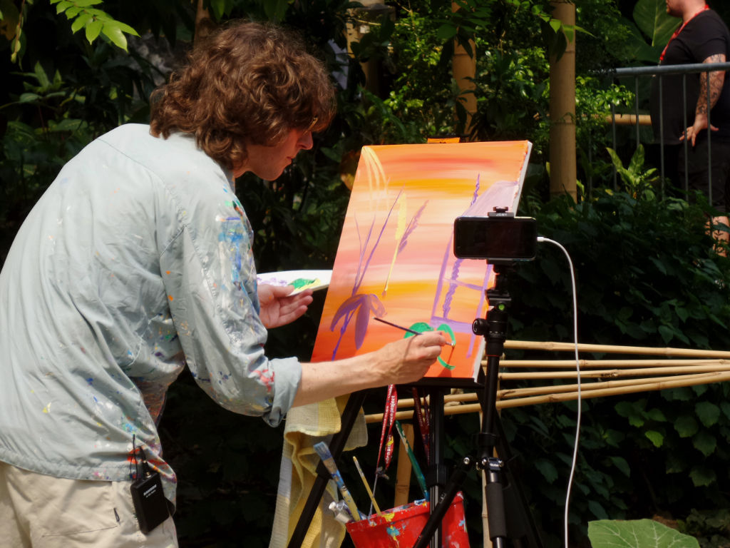 John Dyer painting the rainforest at Eden Project