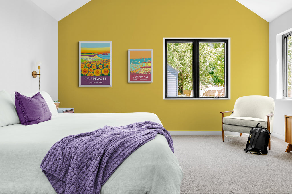 Joanne Short posters on a yellow wall