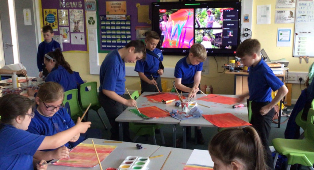 Children painting along with John Dyer via Zoom