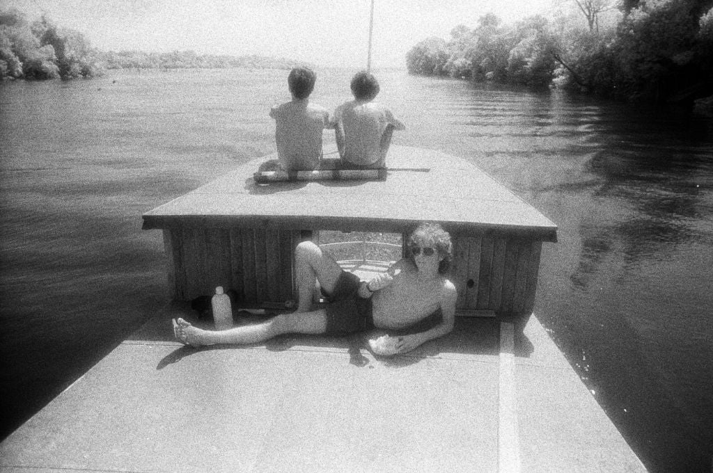 John Dyer pictured travelling on the Amazon river in Brazil in 1989