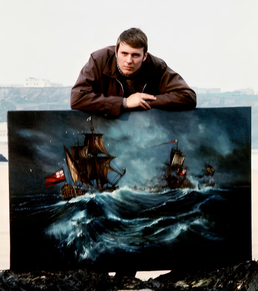 Cornish's artist Ted Dyer photographed on the each at Newquay in the 1970s with a large painting of galleons on a rough sea
