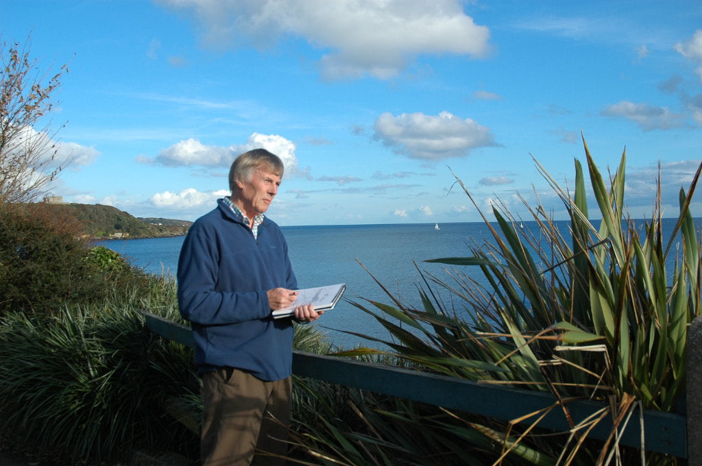 Artist Ted Dyer sketching on Falmouth seafront
