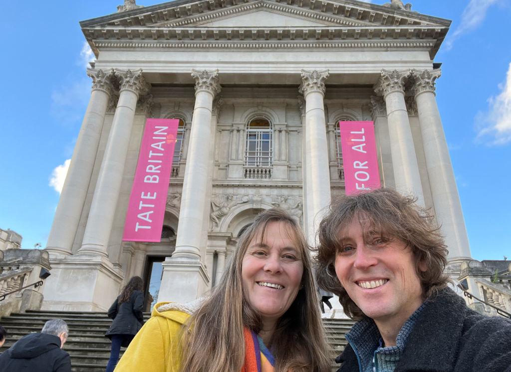 British artists Joanne Short and John Dyer on the steps of Tate Britain art gallery in London