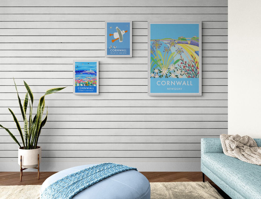 Beach house art coastal wall art poster prints in a living room setting