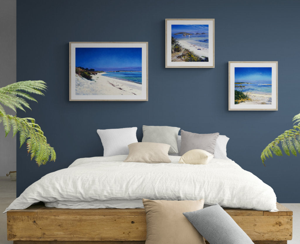 Bedroom scene with Ted Dyer coastal Artwork