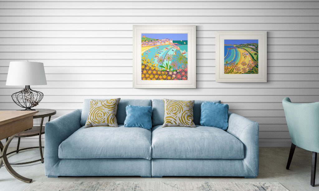 Coastal wall art original oil painting by Cornish artist Joanne Short displayed in a beach home living room setting