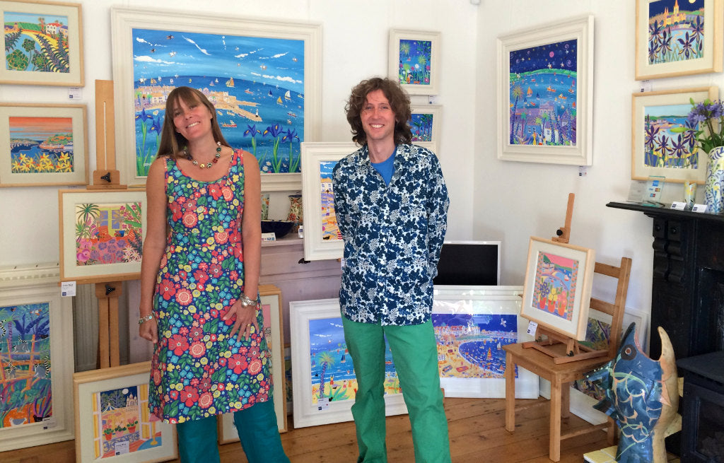 Cornish artists Joanne Short and John Dyer pictured in the exclusive by appointment and online John Dyer Gallery with their paintings in Falmouth, Cornwall.