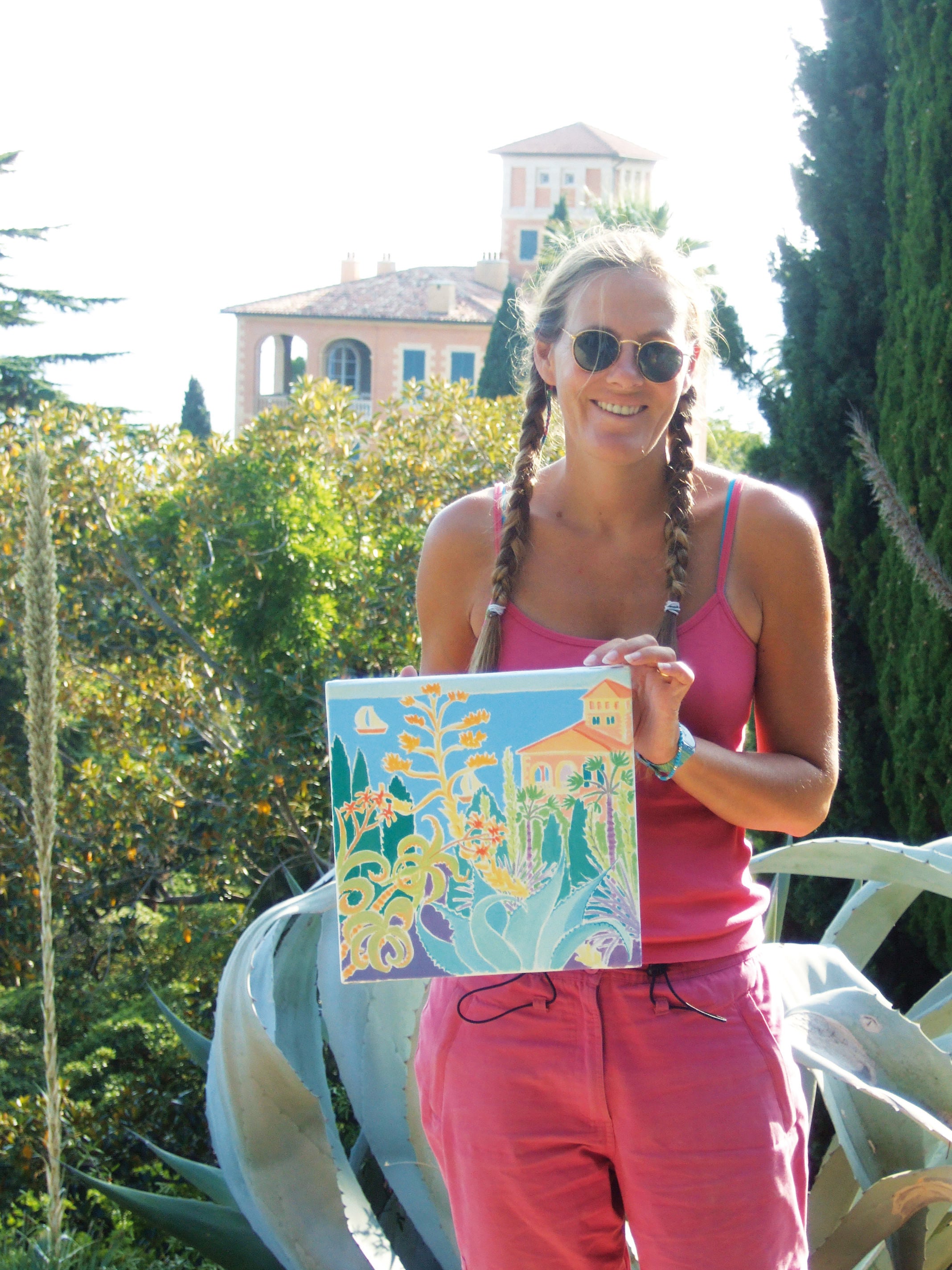 Artist Joanne Short with her painting of the Giardini Hanbury Villa in the Giardini Hanbury, La Mortola, Italy.