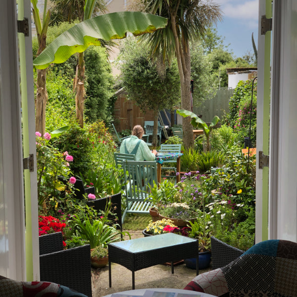 Artist Joanne Short at work in her garden in Cornwall