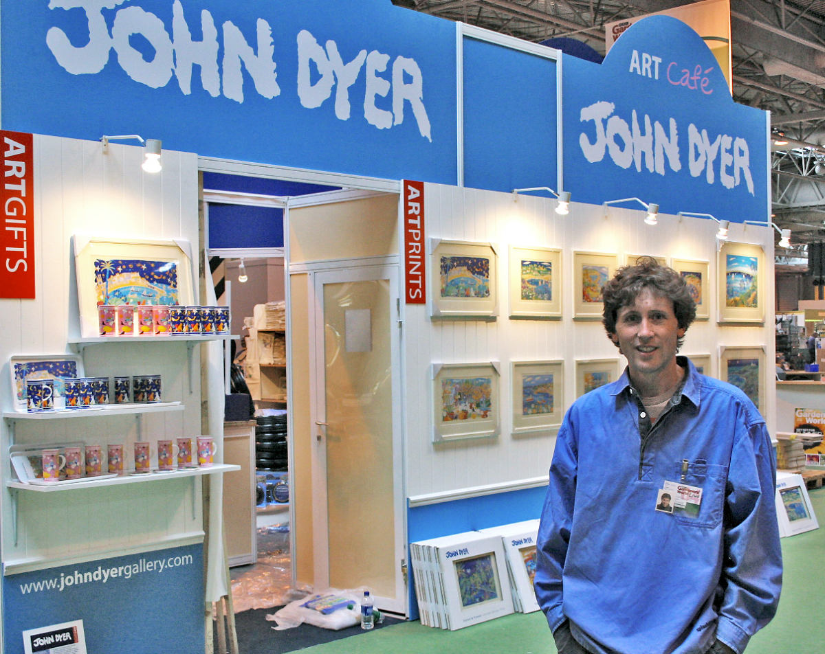 Artist John Dyer in front of the main John Dyer stand at BBC Gardeners' World Live