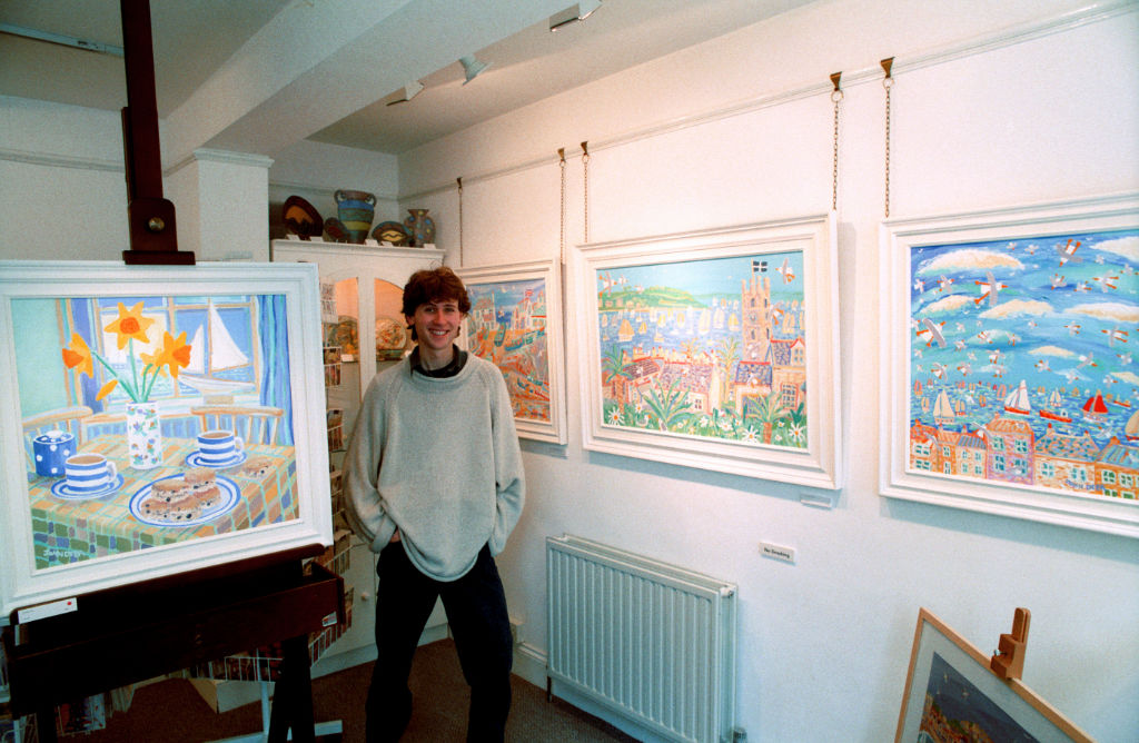 Above: Artist John Dyer pictured in Beside The Wave Gallery in Falmouth in the 1990s that he founded with his family. The Gallery has since been sold and the Dyer family exhibit exclusively with The John Dyer Gallery.