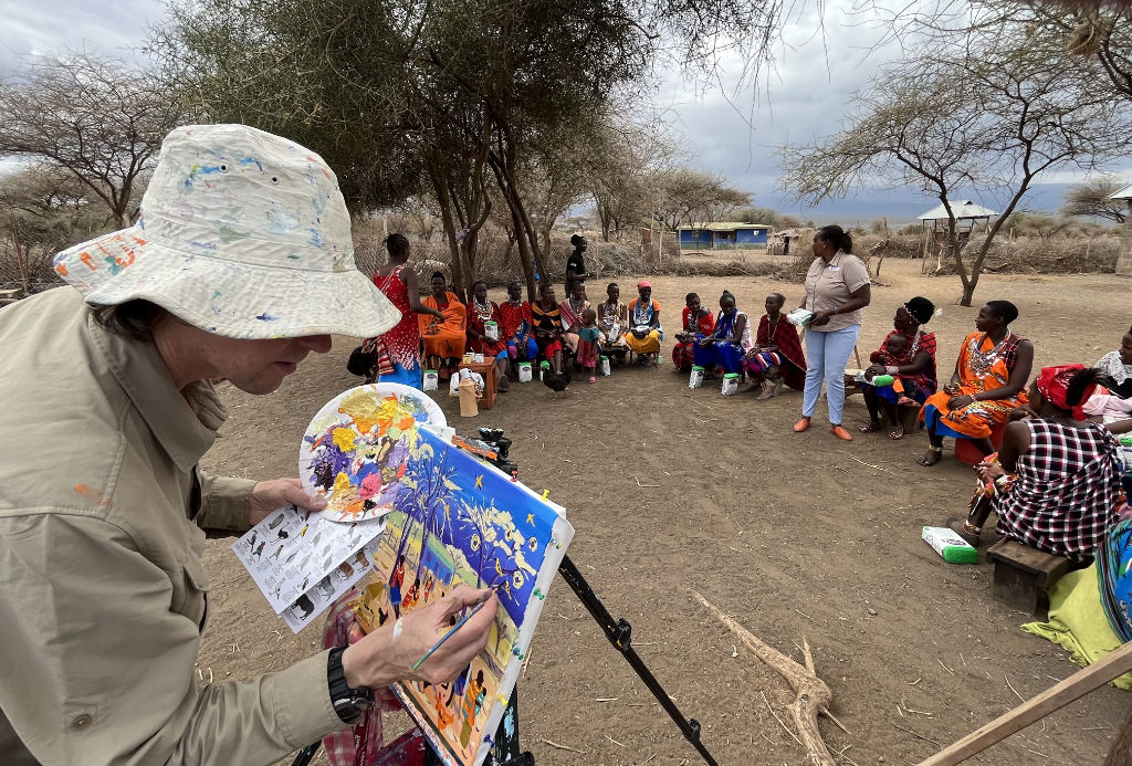 John Dyer at work painting the Maasai tribe in Kenya