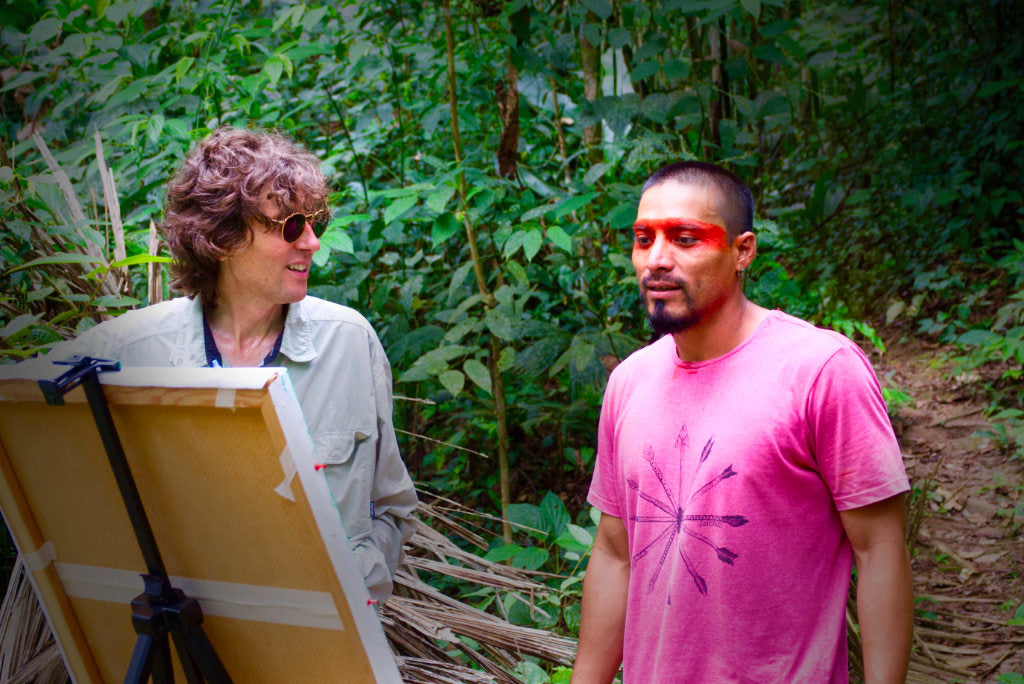 Above: Artist John Dyer, the founder of Last Chance to Paint, pictured in the Amazon rainforest with Amazon Indian Nixiwaka Yawanawá during the first Last Chance to Paint expedition in June 2019