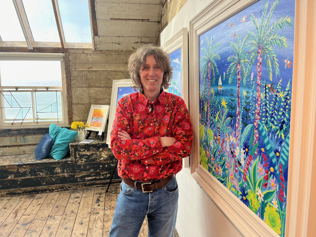 artist John dyer with his paintings