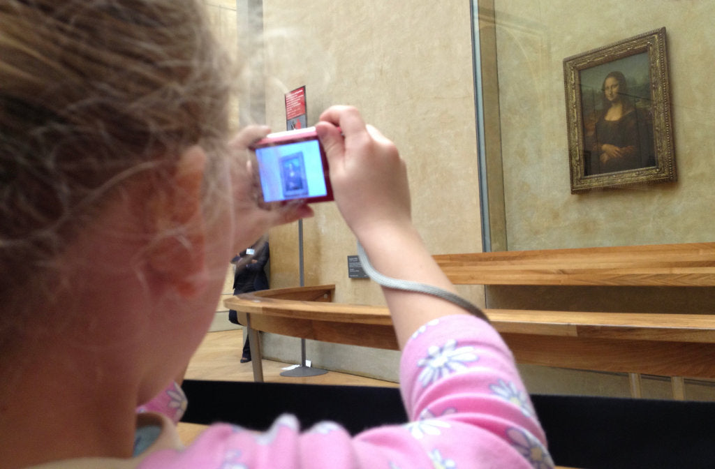 Photographing the Mona Lisa, in The Louvres, Paris