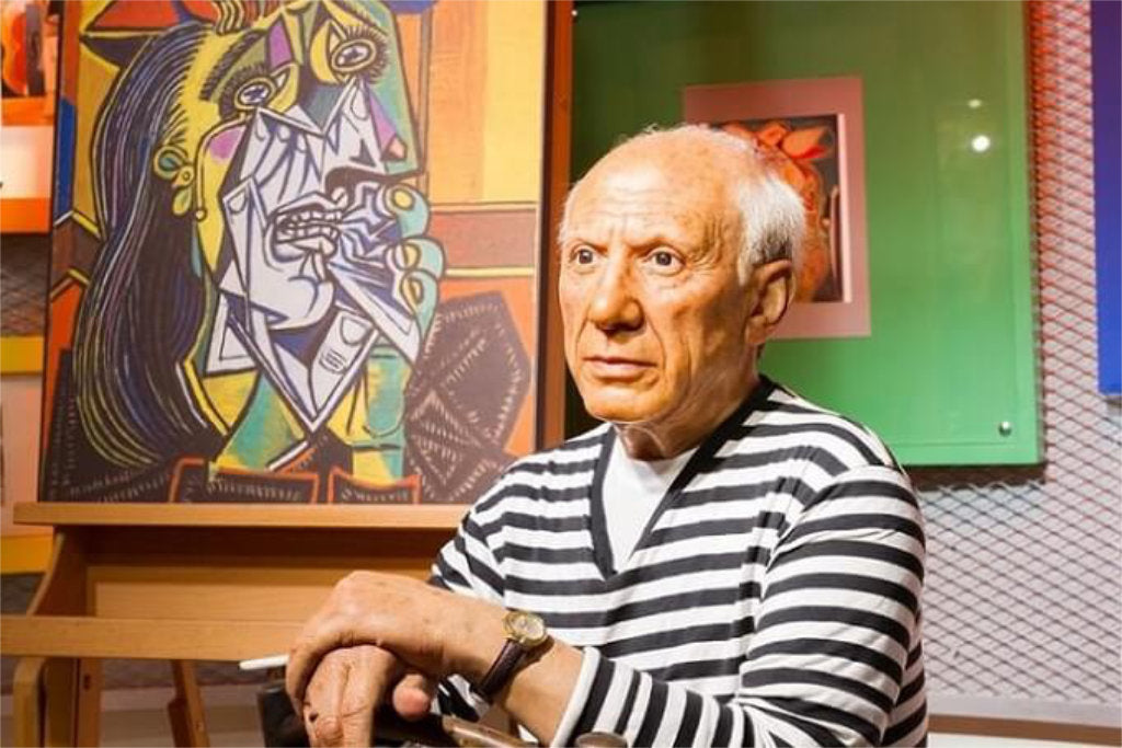 Photograph from The Times of Picasso with his painting 'Weeping Woman'
