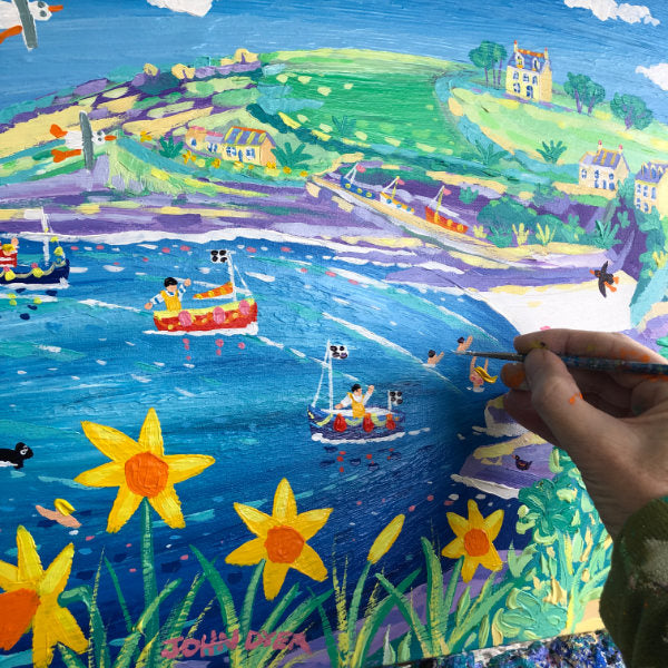 John Dyer at work on  a new painting of Prussia Cove in Cornwall