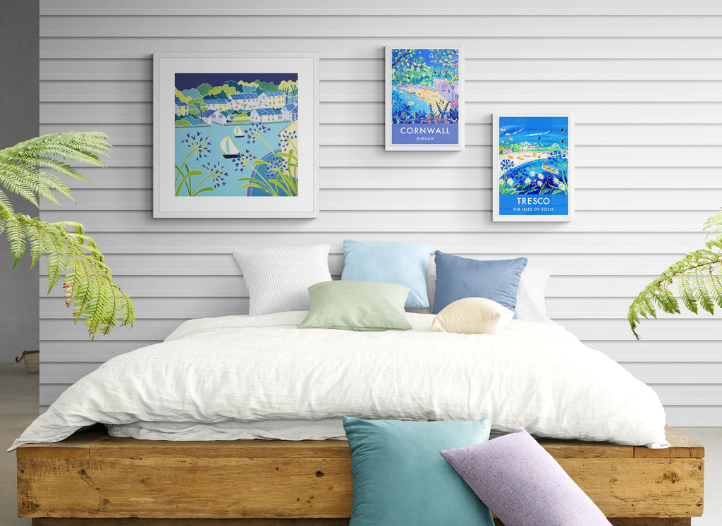 Relaxed coastal style bedroom with Cornwall art poster prints