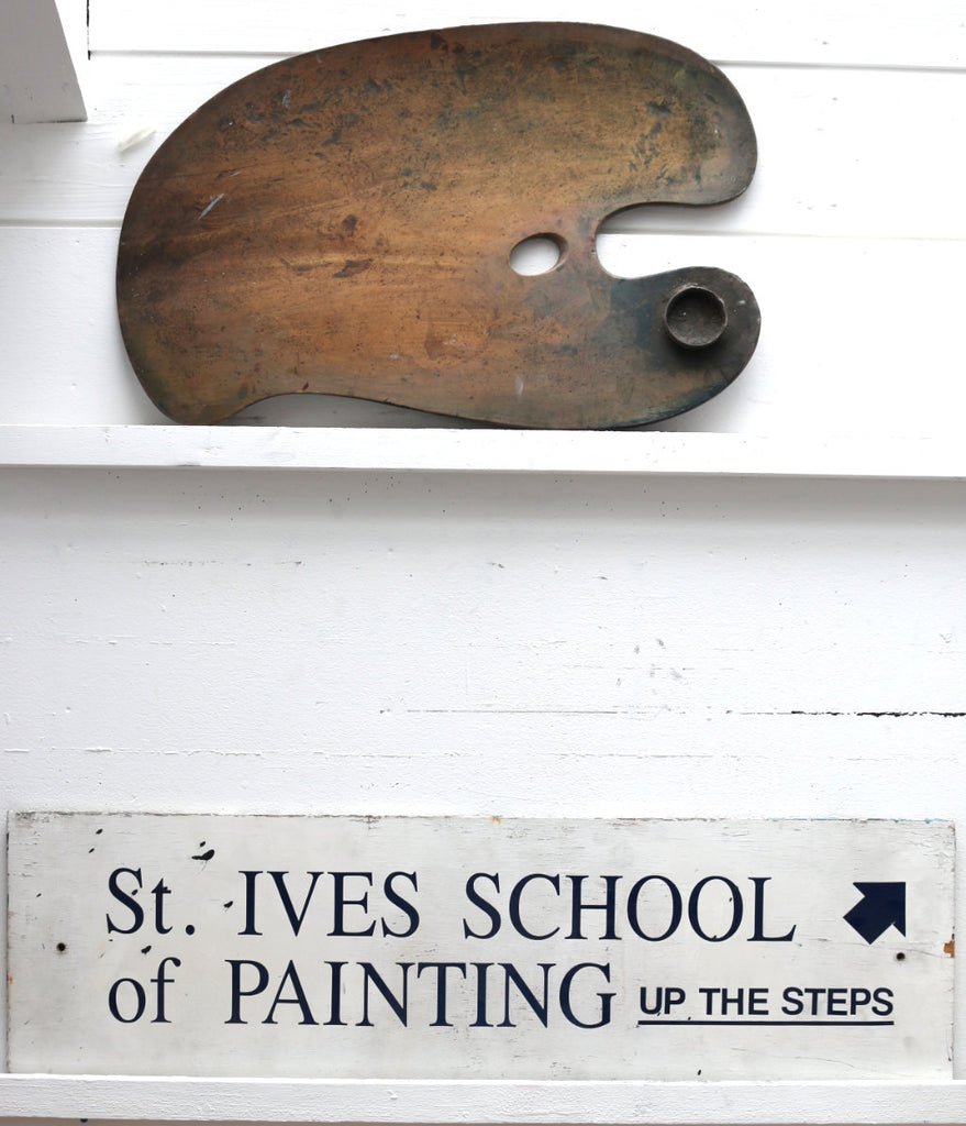 St Ives School of Painting sign and art palette on whitewashed wood creating a perfect artistic and seaside feel