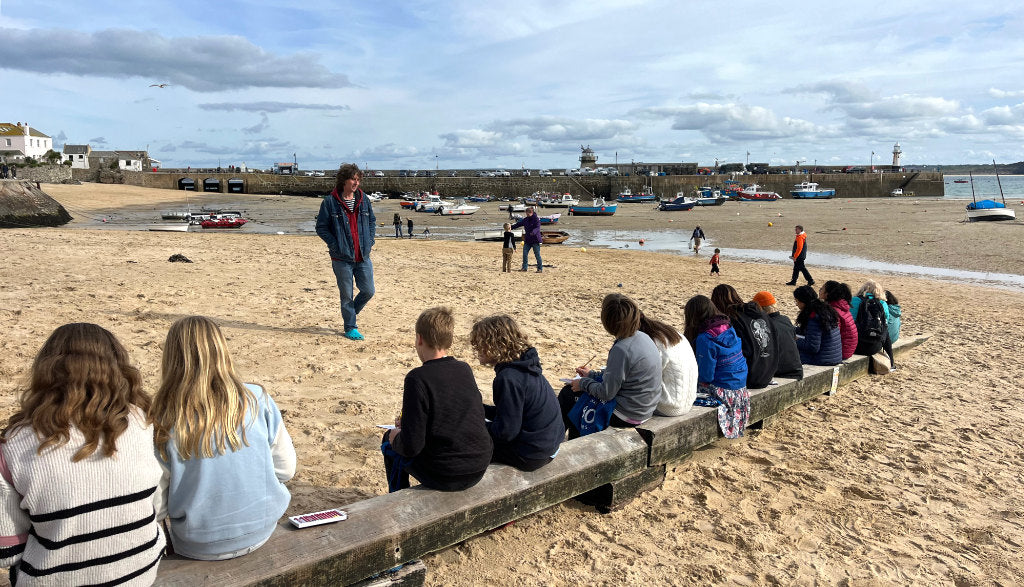 Children at the St Ives School of Painting workshop drawing St Ives harbour