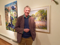 Artist Ted Dyer in the Falmouth Art GAllery with his painting 'Lavender-time, Provence'.