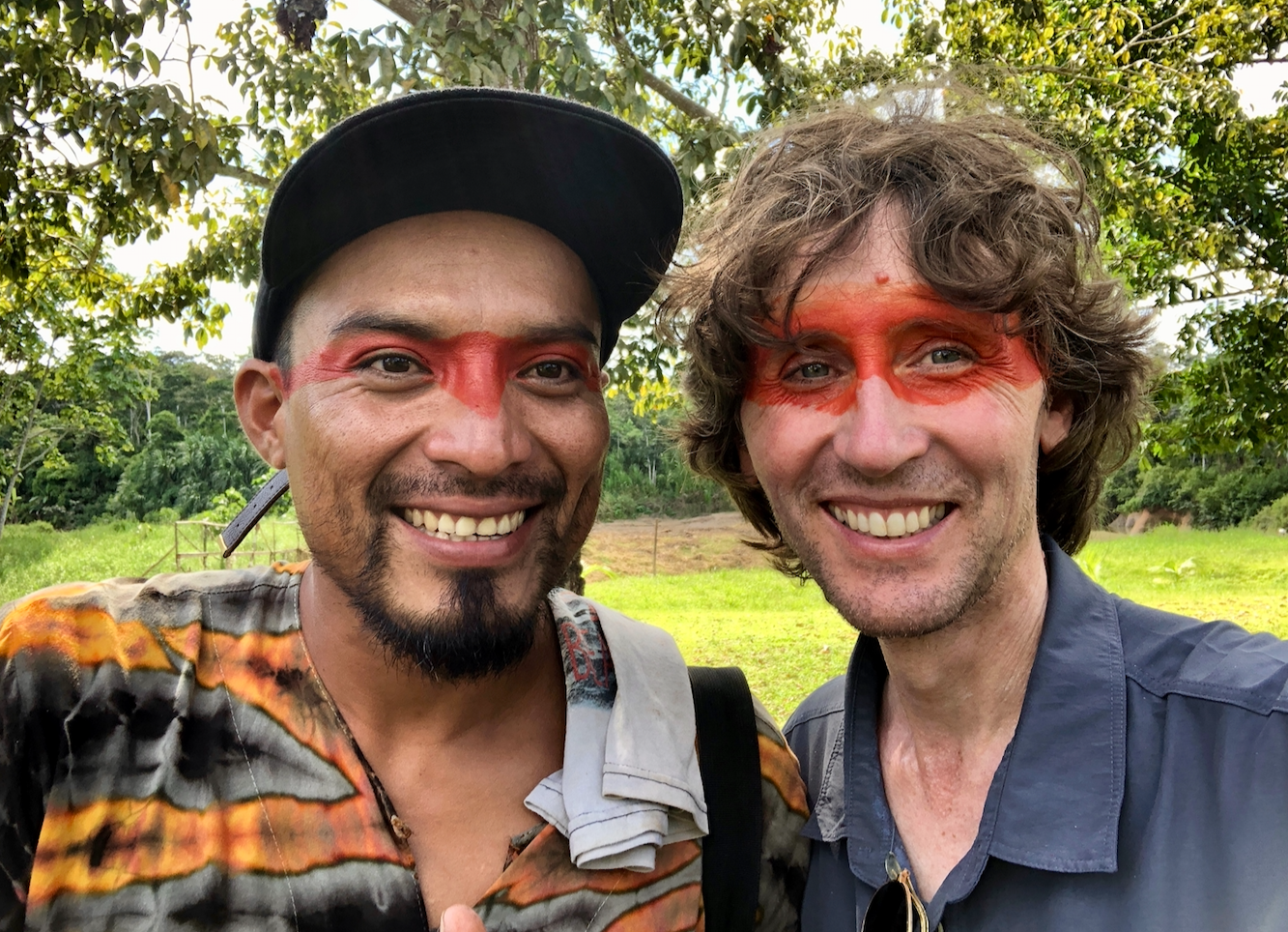 Amazon Indian Nixiwaka Yawanawá and British artist John Dyer pictured in the tribal village of Mutum in the Amazon rainforest, Brazil.