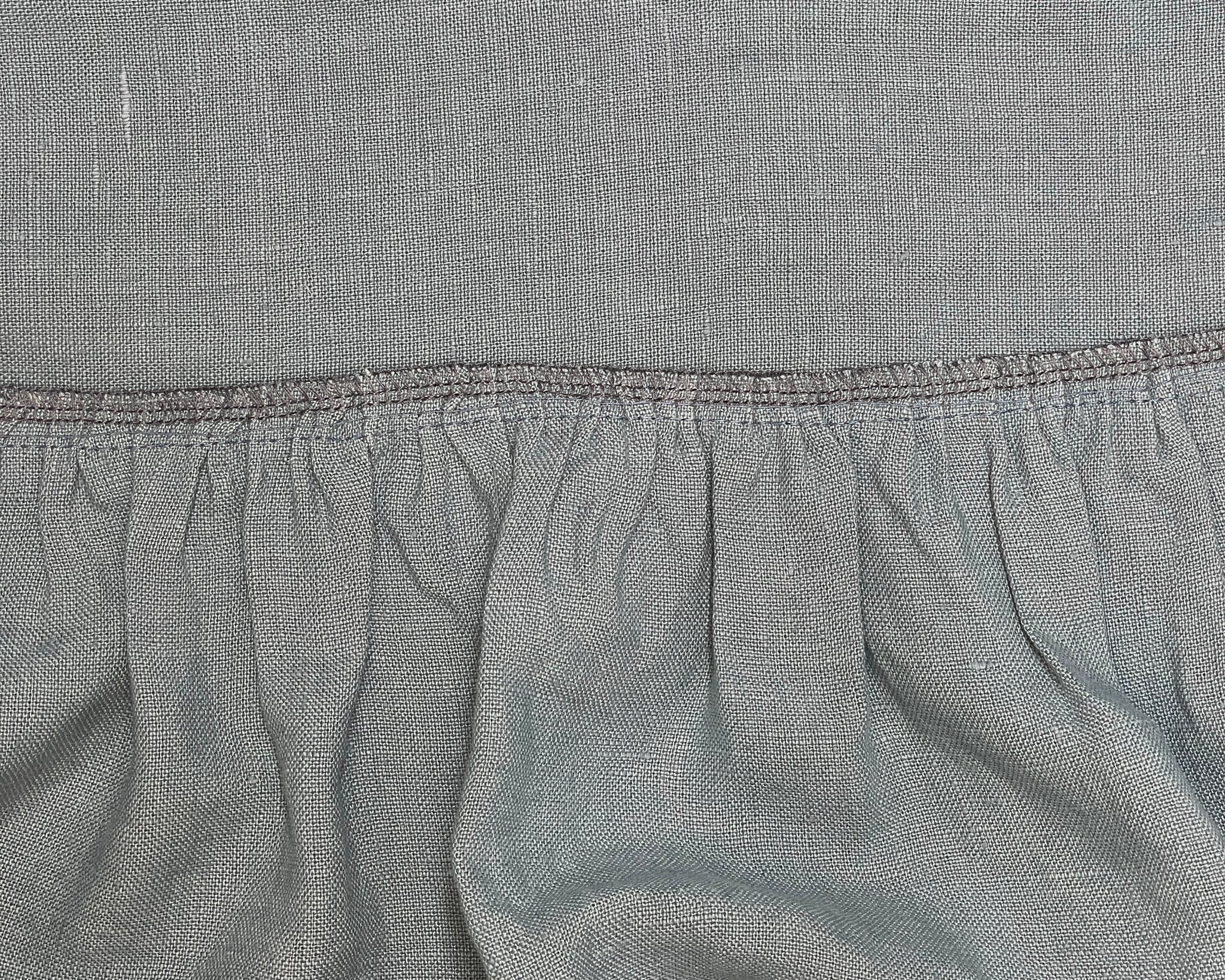 Finish the seam with a serger or zigzag stitch, press seam towards dress