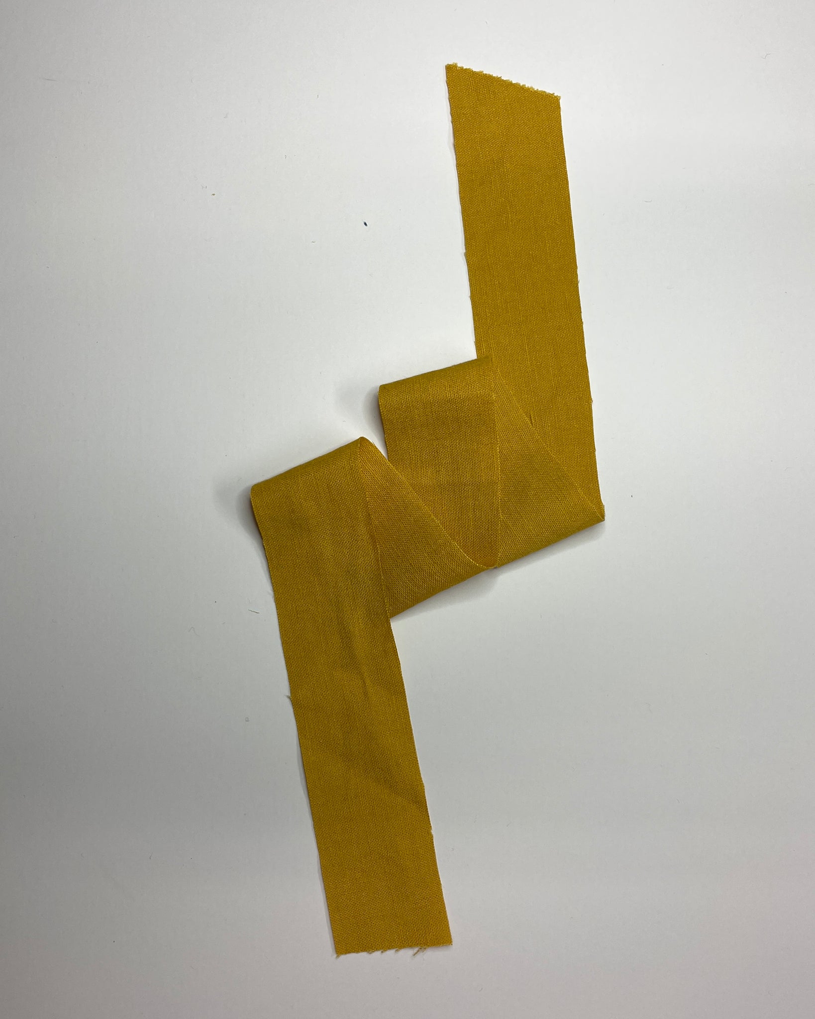 A yellow strip of fabric