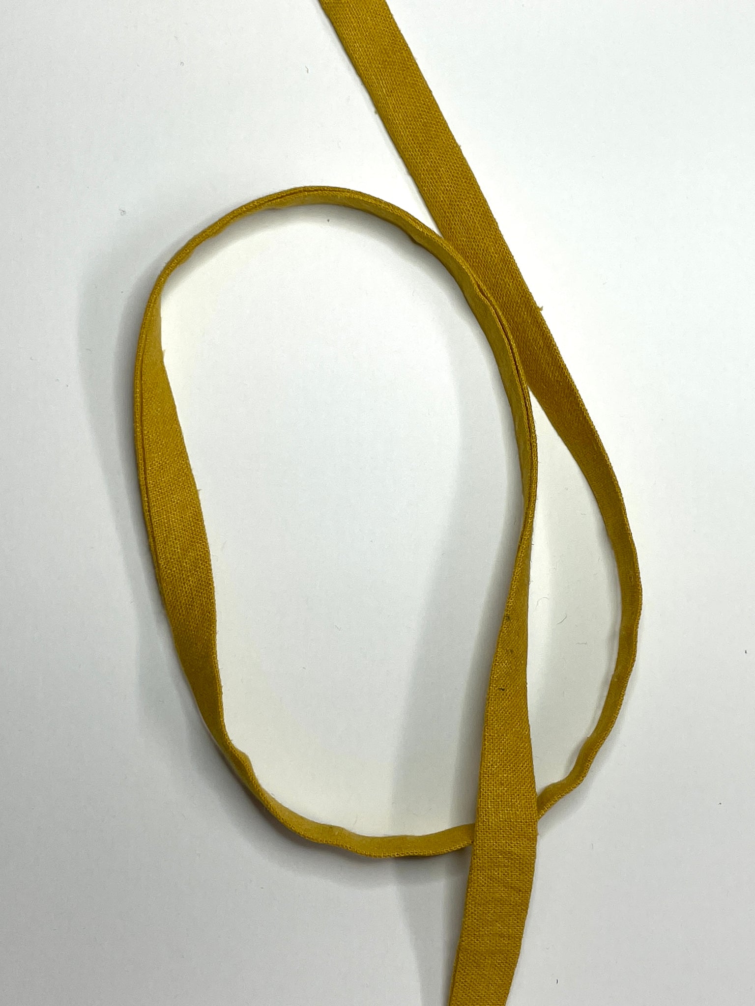 Pressed completed yellow waist tie
