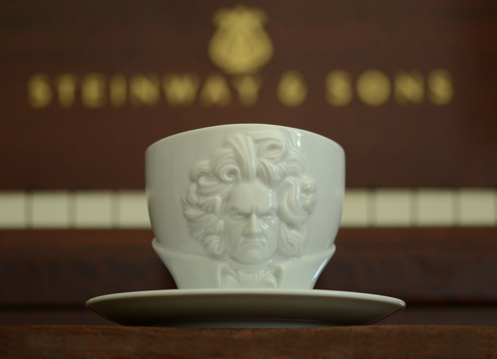 TALENT Series porcelain cups featuring portraits of Mozart, Beethoven, Shakespeare, Wagner, and Goethe in lifelike detail. Quality porcelain cups Made in Germany from finest porcelain by FIFTYEIGHT PRODUCTS.