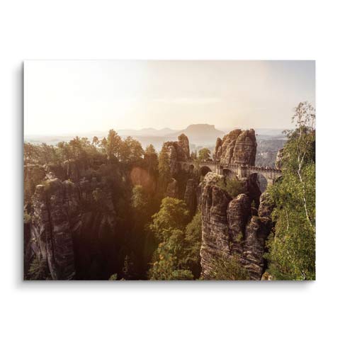 Tableau mural avec des montagnes au coucher du soleil de ARTMIND