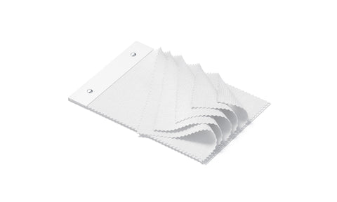 A pack of white cloths lying partially folded. 