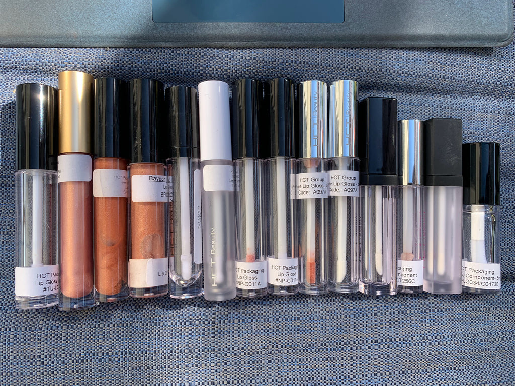 Stock cosmetic packaging lip gloss tubes