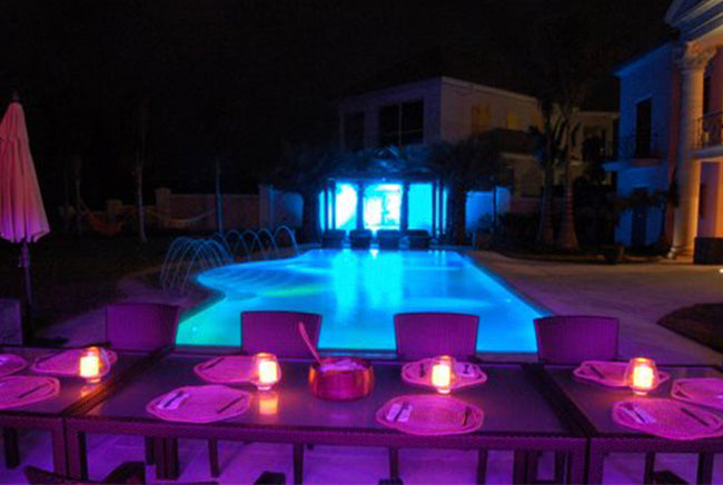 Residential Home Exterior and Pool illuminated with Specialty Lighting