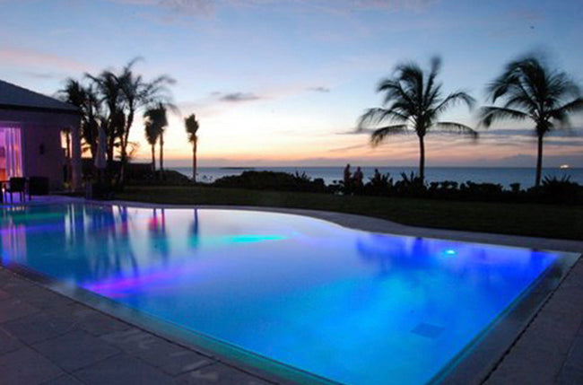 Residential Home Exterior and Pool illuminated with Specialty Lighting