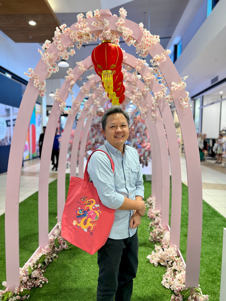 Chris Chun with his limited edition tote bag