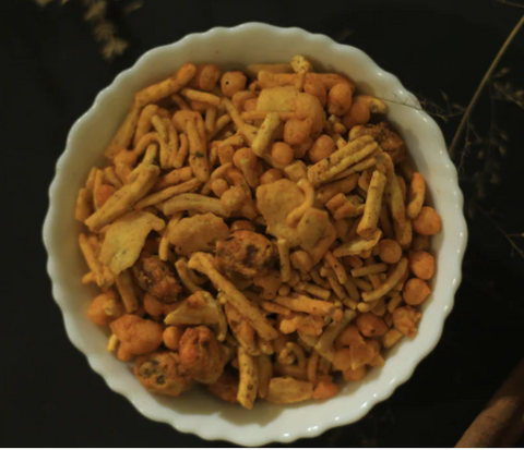 A bowl filled with Indian snack, spicy mix