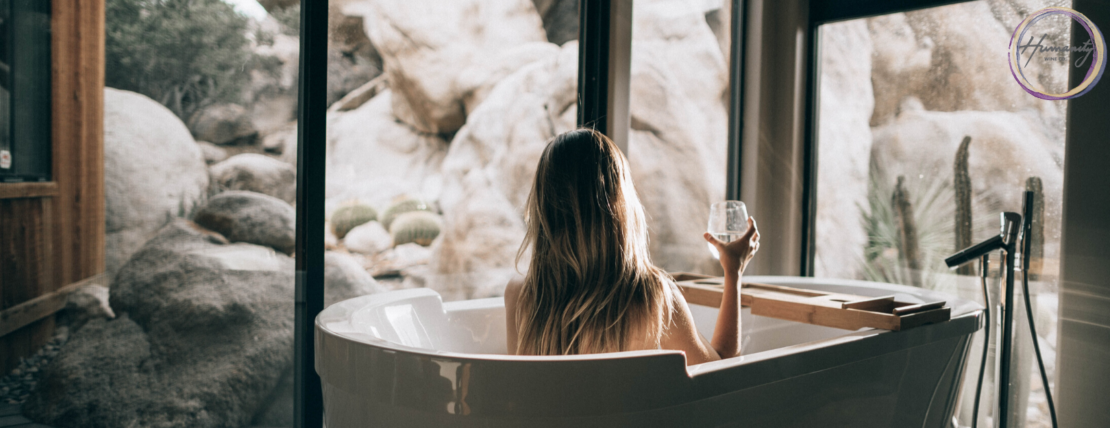 Relax in the bath with a glass of wine