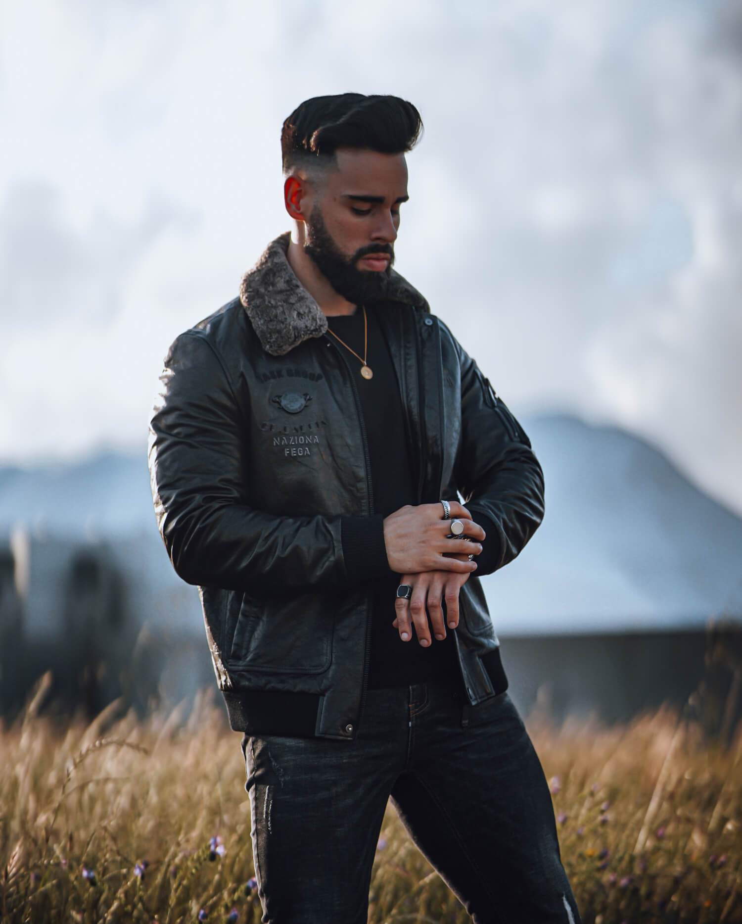 black leather bomber jacket with fur collar