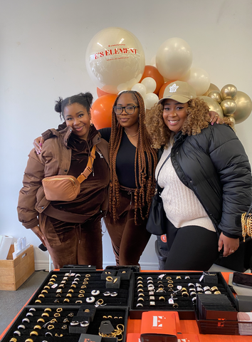 E's Element owner Emmanuela Okon at a pop-up market booth with customers