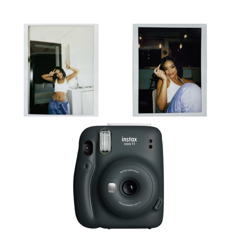Polaroid camera with two printed polaroid pictures