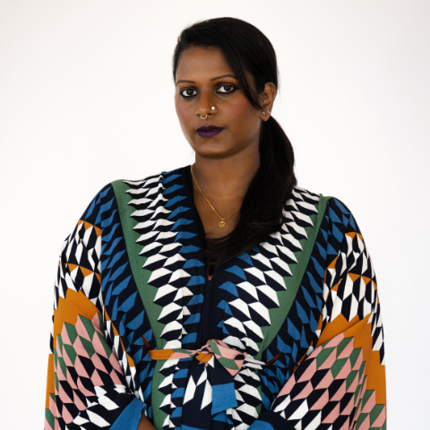Sarah Sukumaran wearing a patterned dress