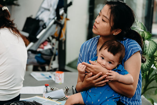 Mom attending with a baby