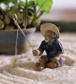 Fisherman in blue with fishing rod bonsai miniature figurine – Gaia Pottery  In