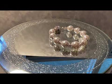 Load and play video in Gallery viewer, Video of white pearl bracelet
