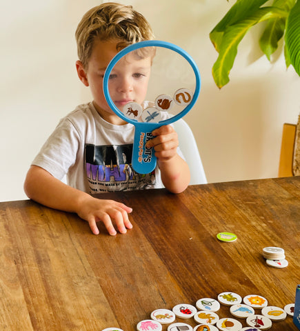 A young child playing bandits memory mix up