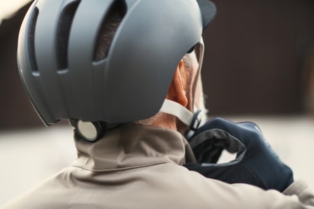 Motorized bike helmet with straps.